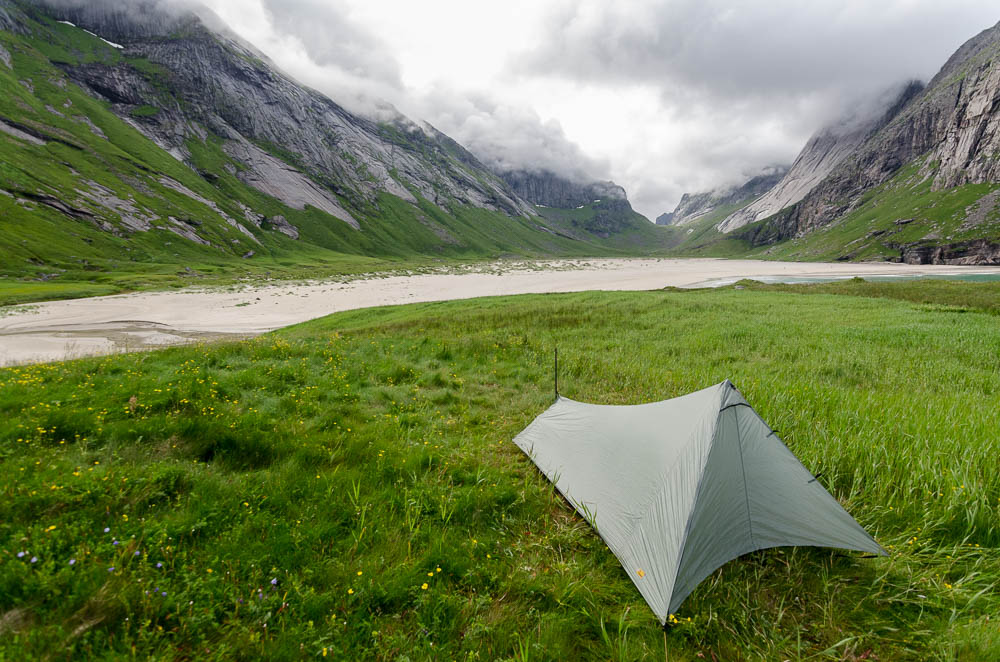 Spending the night by the beach, with towering mountains surrounding you is impressive