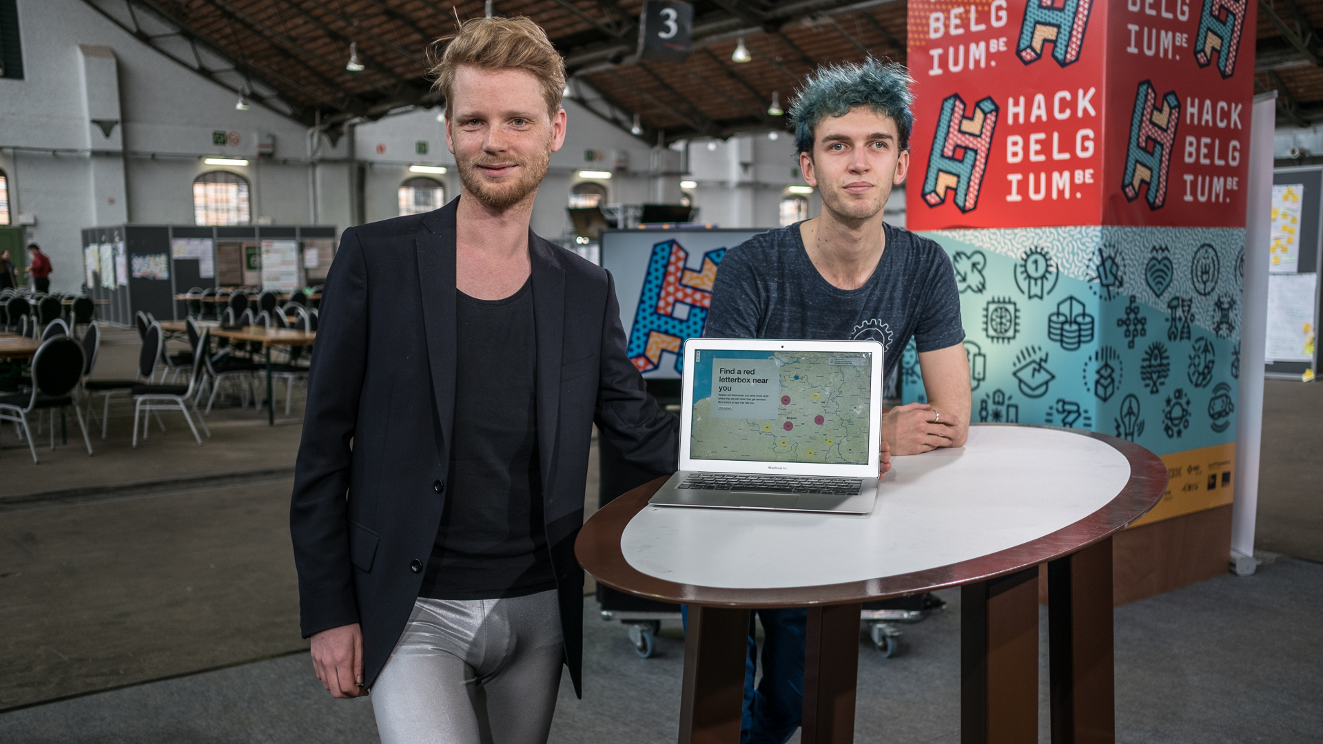 Eric Schrijver (left) of I like tight pants and mathematics and Luc Rocher (right), PhD student at UCL, at Hack Belgium in Tour & Taxis, Brussels.